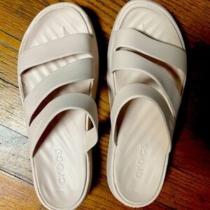 CROCS Monterey strappy wedge. Never worn. Fit more like an 8 1/2